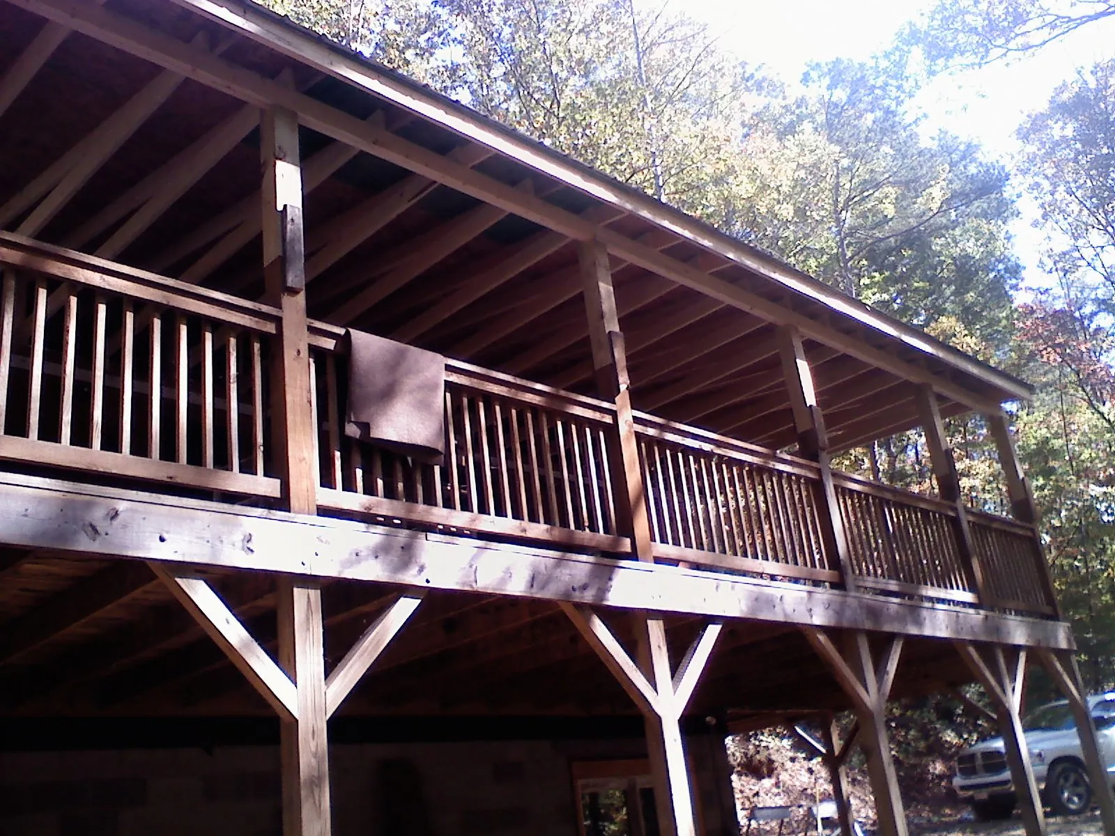 Timber framing under a new elevated porch and deck — Roof Leak Repair in La Grange by Roofing Brothers
